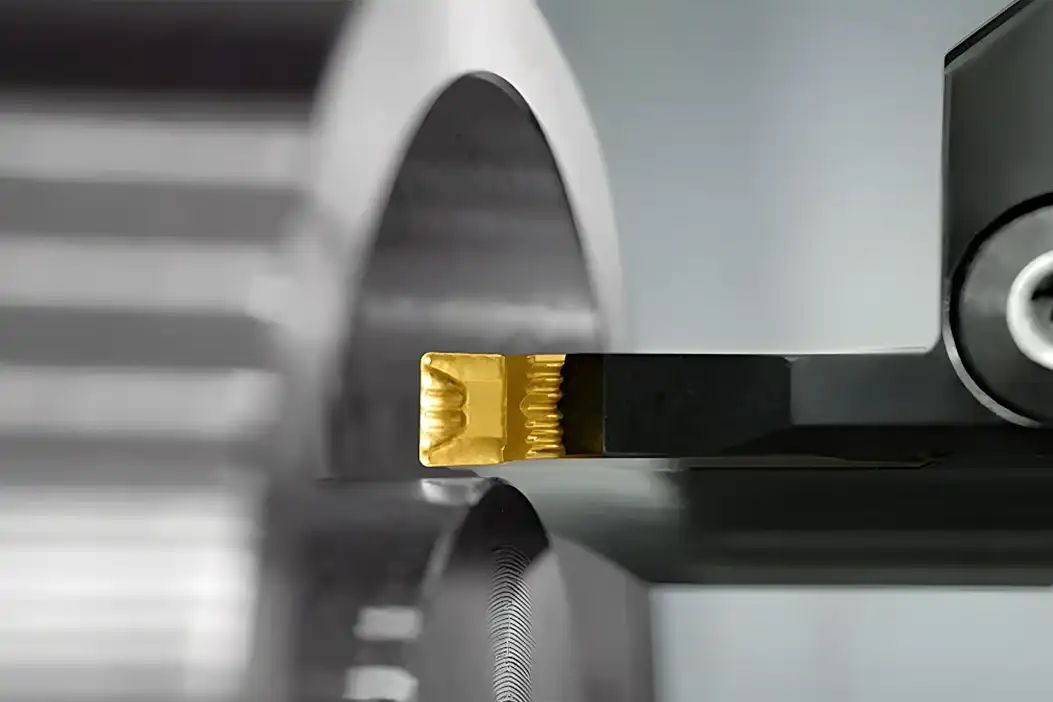 Grooving and parting operation with a carbide insert